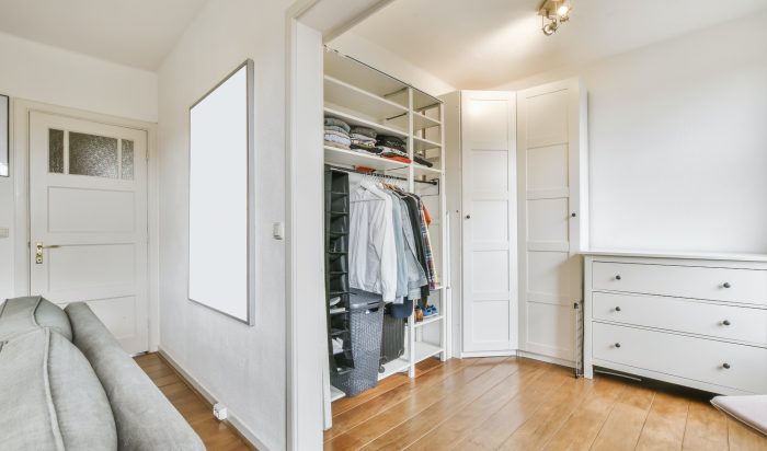 Delightful dressing room with hanged clothes